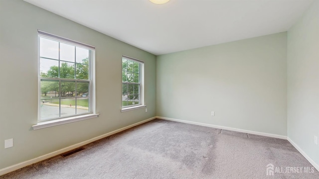 612 Magnolia Rd, North Brunswick, NJ 08902 - empty room featuring carpet flooring and baseboards