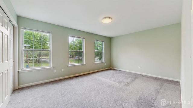 612 Magnolia Rd, North Brunswick, NJ 08902 - empty room featuring carpet flooring and baseboards
