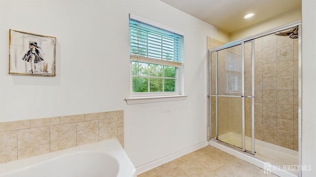 612 Magnolia Rd, North Brunswick, NJ 08902 - bathroom featuring a shower stall, tile patterned floors, a bath, baseboards, and recessed lighting