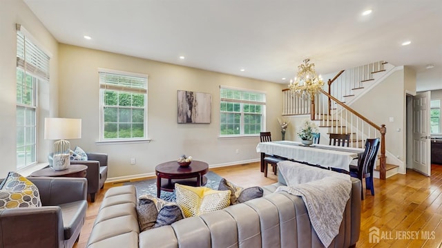 612 Magnolia Rd, North Brunswick, NJ 08902 - living area featuring stairway, light wood-style floors, recessed lighting, a chandelier, and baseboards