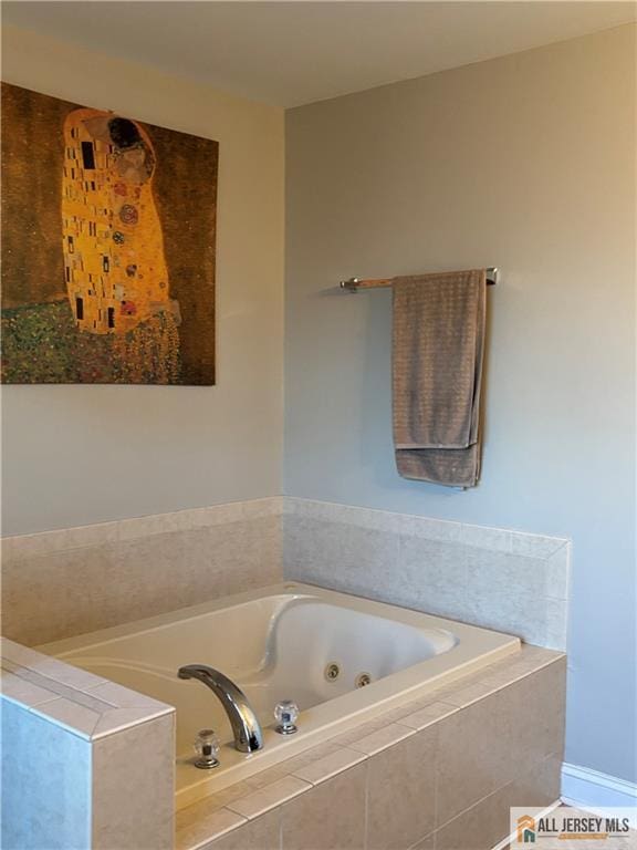 bathroom with a jetted tub