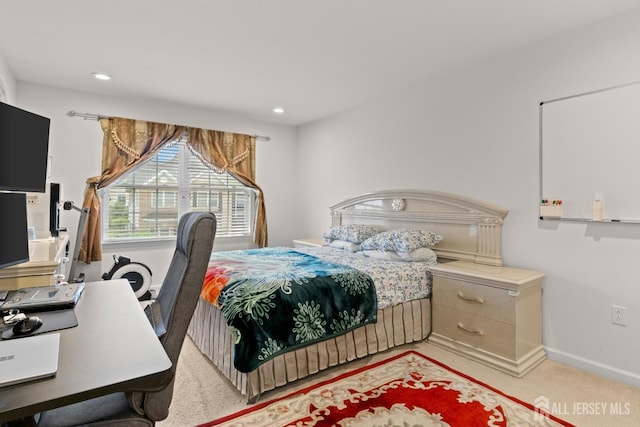 bedroom featuring recessed lighting, baseboards, an office area, and light carpet