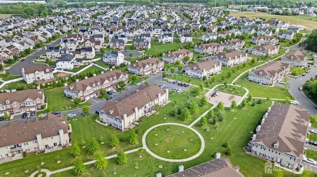 aerial view of property's location with nearby suburban area
