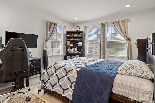 bedroom featuring carpet and recessed lighting