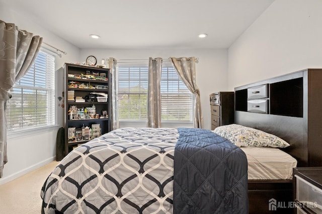 bedroom with carpet, baseboards, and recessed lighting