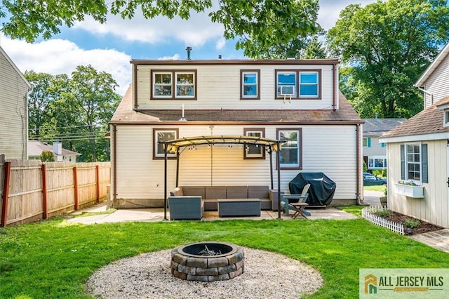 121 E Cliff Rd, Colonia, NJ 07067 - rear view of property featuring an outdoor living space with a fire pit, a patio, cooling unit, and roof with shingles