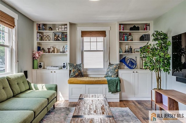 121 E Cliff Rd, Colonia, NJ 07067 - living room with wood finished floors and healthy amount of natural light