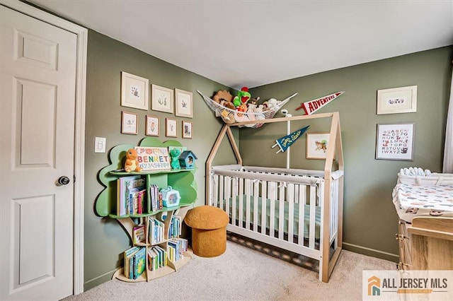 121 E Cliff Rd, Colonia, NJ 07067 - bedroom featuring carpet flooring and a nursery area
