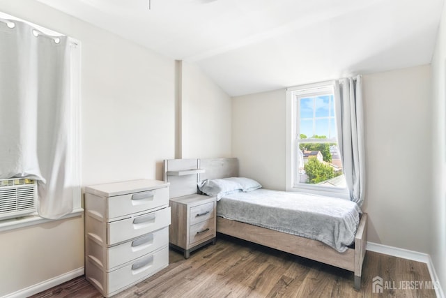 68 Pennsylvania Ave, Perth Amboy, NJ 08861 - bedroom featuring wood finished floors, baseboards, and lofted ceiling