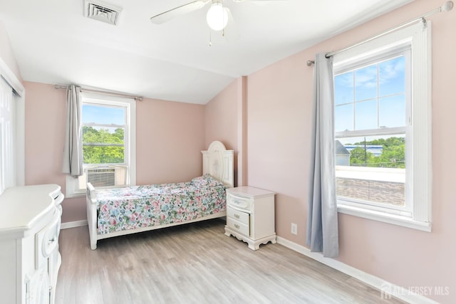 68 Pennsylvania Ave, Perth Amboy, NJ 08861 - bedroom featuring light wood-type flooring, baseboards, ceiling fan, and vaulted ceiling