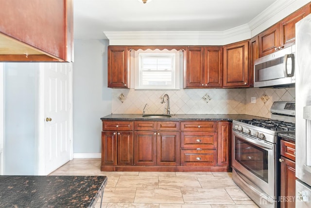 68 Pennsylvania Ave, Perth Amboy, NJ 08861 - kitchen featuring a sink, stainless steel appliances, decorative backsplash, and dark stone countertops