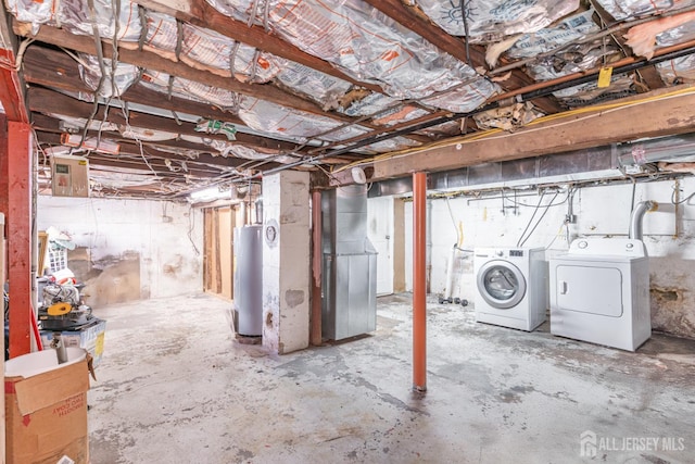 68 Pennsylvania Ave, Perth Amboy, NJ 08861 - unfinished below grade area with washer and dryer and water heater