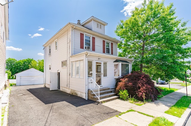 68 Pennsylvania Ave, Perth Amboy, NJ 08861 - american foursquare style home with a detached garage, an outdoor structure, and entry steps