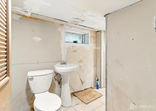 68 Pennsylvania Ave, Perth Amboy, NJ 08861 - bathroom with a towel warming rack and toilet