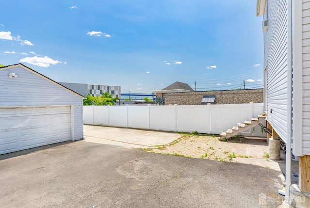 68 Pennsylvania Ave, Perth Amboy, NJ 08861 - view of yard with an outbuilding and a garage
