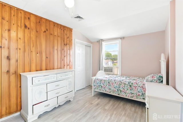 68 Pennsylvania Ave, Perth Amboy, NJ 08861 - bedroom with lofted ceiling, light wood-type flooring, a closet, and cooling unit