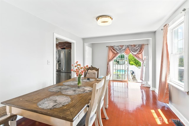 68 Pennsylvania Ave, Perth Amboy, NJ 08861 - dining space with wood finished floors and baseboards
