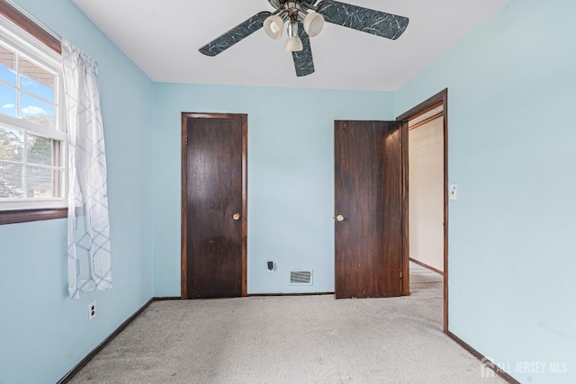 1208 Omaha Rd, North Brunswick, NJ 08902 - unfurnished bedroom featuring ceiling fan and carpet floors