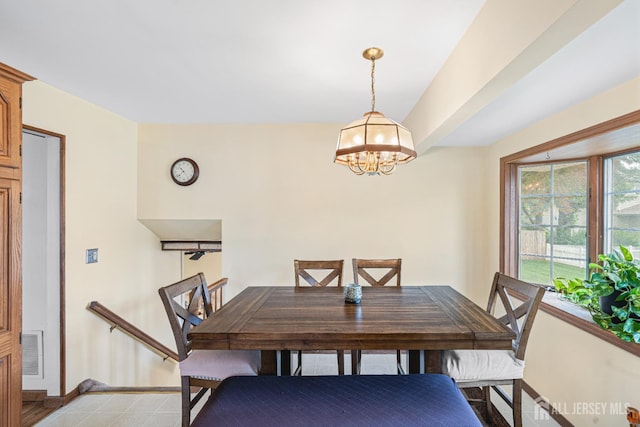 1208 Omaha Rd, North Brunswick, NJ 08902 - dining area featuring baseboards and a chandelier