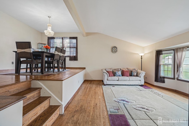 1208 Omaha Rd, North Brunswick, NJ 08902 - living room with a chandelier and wood finished floors