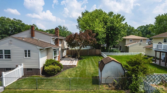 1208 Omaha Rd, North Brunswick, NJ 08902 - view of side of home featuring a storage shed, a fenced backyard, and a chimney