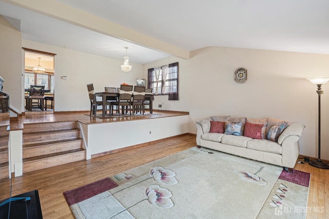 1208 Omaha Rd, North Brunswick, NJ 08902 - living room with wood finished floors, healthy amount of natural light, and beam ceiling