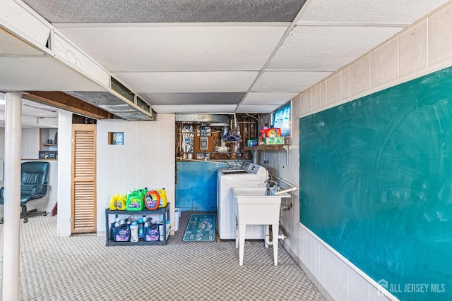 1208 Omaha Rd, North Brunswick, NJ 08902 - finished below grade area featuring a paneled ceiling, carpet, independent washer and dryer, and wooden walls
