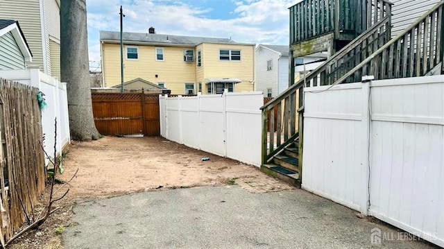 exterior space featuring a fenced backyard