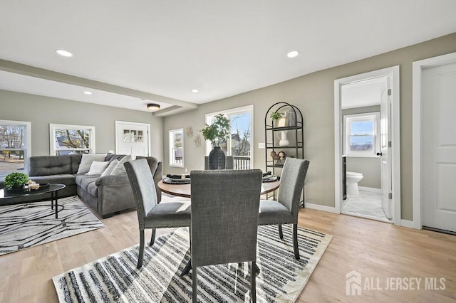 dining area with light wood finished floors, recessed lighting, and baseboards