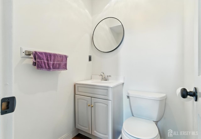 1682 Taylor Dr, North Brunswick, NJ 08902 - half bathroom with vanity and toilet