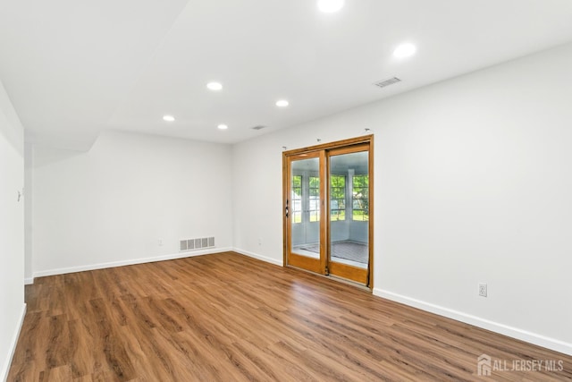 1682 Taylor Dr, North Brunswick, NJ 08902 - empty room featuring recessed lighting and wood finished floors