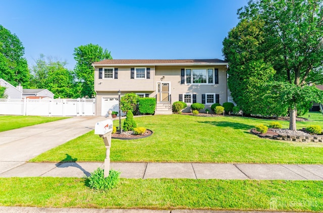 1682 Taylor Dr, North Brunswick, NJ 08902 - split foyer home with driveway and an attached garage