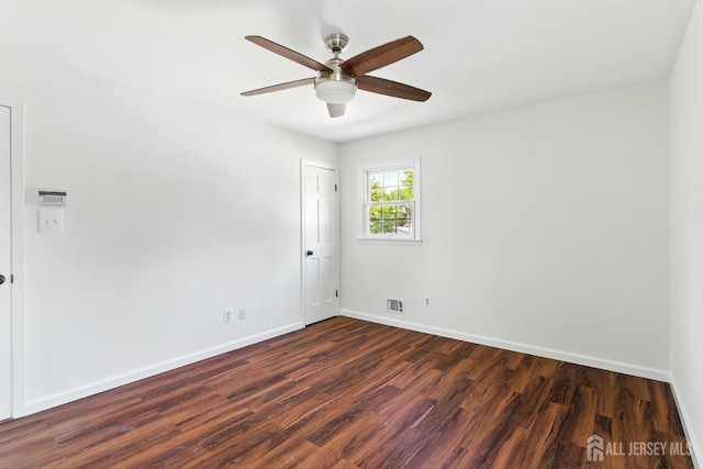 1682 Taylor Dr, North Brunswick, NJ 08902 - spare room with dark wood-style floors and a ceiling fan
