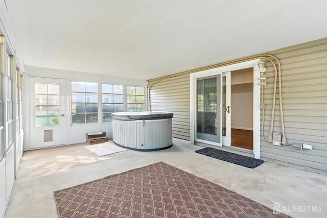 1682 Taylor Dr, North Brunswick, NJ 08902 - unfurnished sunroom featuring a hot tub and french doors