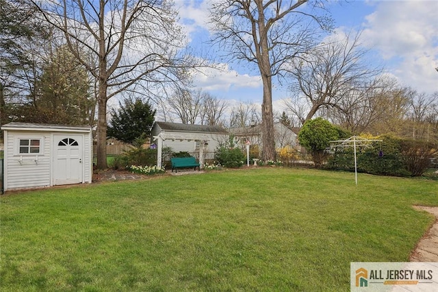 435 2nd St, Middlesex, NJ 08846 - view of green lawn featuring a storage shed and an outdoor structure