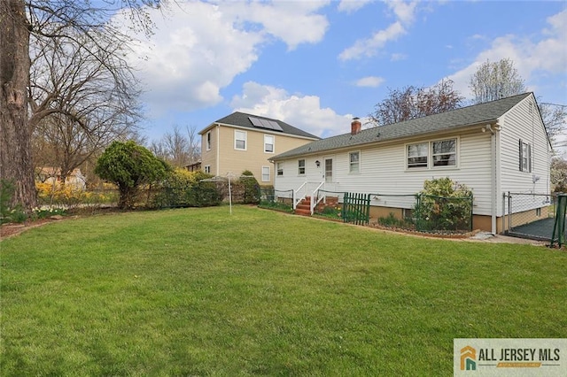 435 2nd St, Middlesex, NJ 08846 - rear view of property featuring a chimney