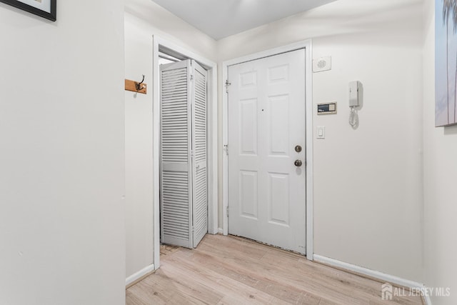 907 Meadow Ct, Helmetta, NJ 08828 - entryway with light wood finished floors and baseboards