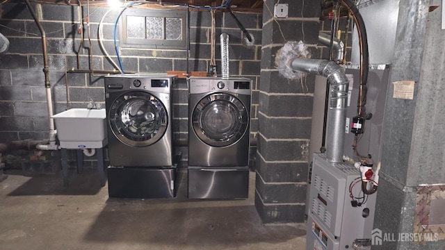 22 Delaney Ct, South Plainfield, NJ 07080 - laundry room featuring washer and dryer and heating unit