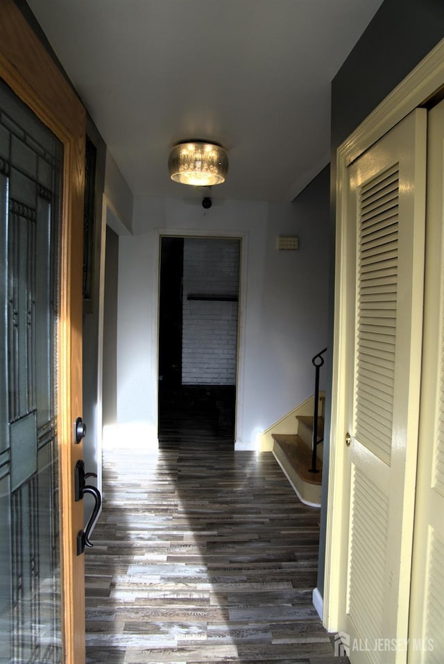 22 Delaney Ct, South Plainfield, NJ 07080 - corridor featuring wood finished floors, baseboards, and stairway