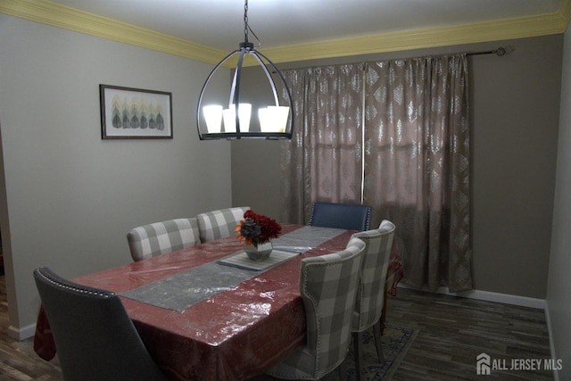 22 Delaney Ct, South Plainfield, NJ 07080 - dining area with ornamental molding, wood finished floors, and baseboards