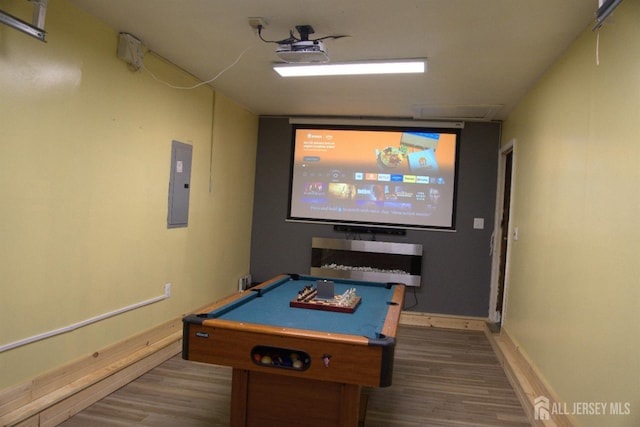 22 Delaney Ct, South Plainfield, NJ 07080 - rec room featuring wood finished floors, baseboards, and electric panel