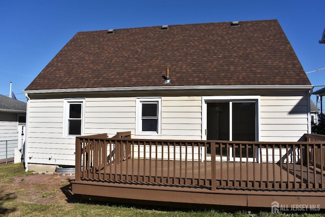 30 John St, South River, NJ 08882 - back of property with a deck and a shingled roof