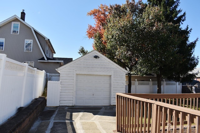 30 John St, South River, NJ 08882 - detached garage featuring fence and concrete driveway