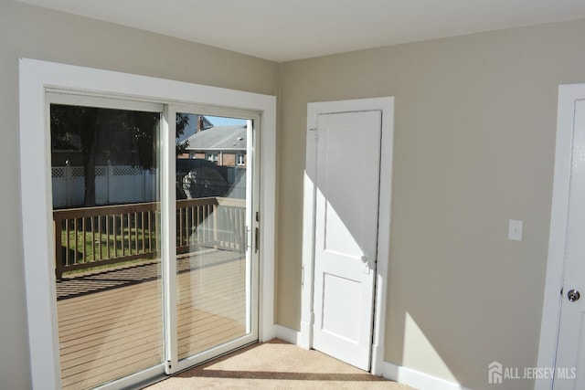 30 John St, South River, NJ 08882 - doorway featuring carpet flooring and baseboards