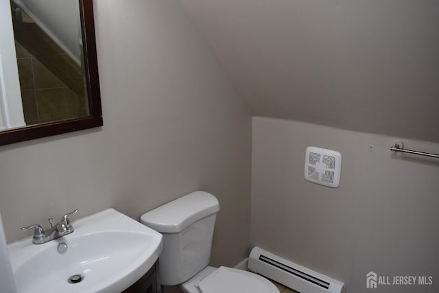 30 John St, South River, NJ 08882 - half bathroom with a baseboard radiator, toilet, and a sink