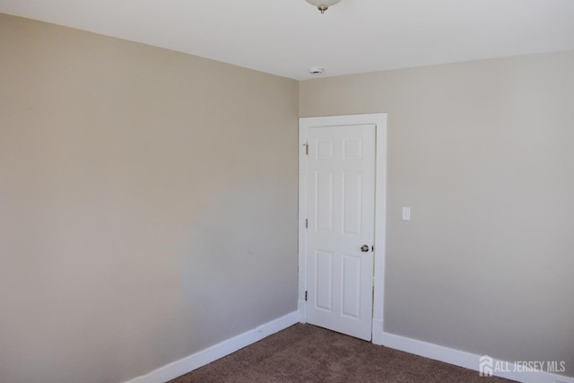 30 John St, South River, NJ 08882 - unfurnished room featuring dark colored carpet and baseboards
