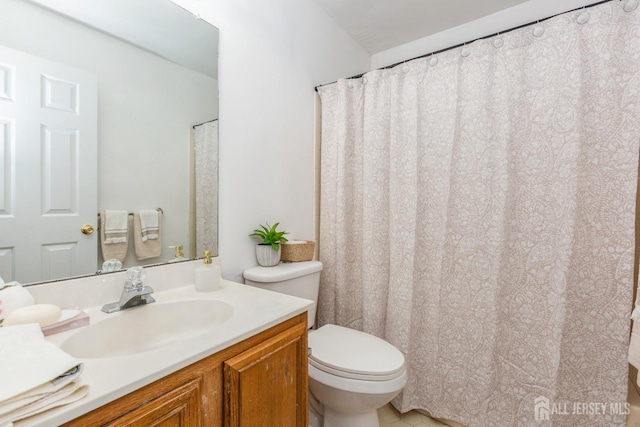 full bath with toilet and vanity