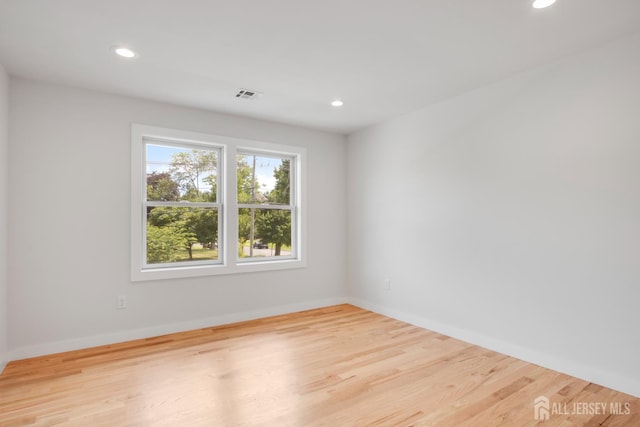 705 Plainfield Ave, Piscataway, NJ 08854 - empty room with recessed lighting and wood finished floors