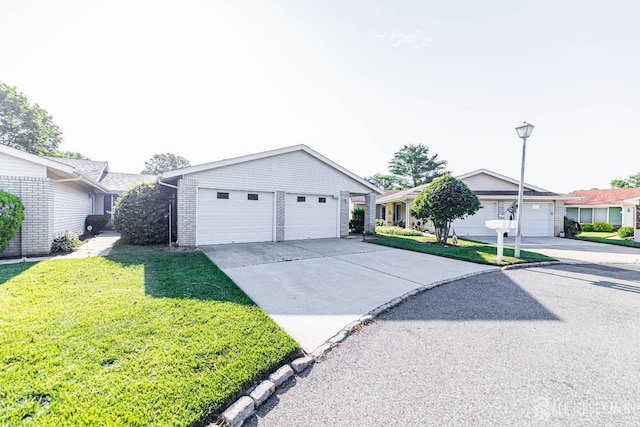 372-B Duranta Plz, Monroe, NJ 08831 - single story home featuring a front yard, a detached garage, and brick siding