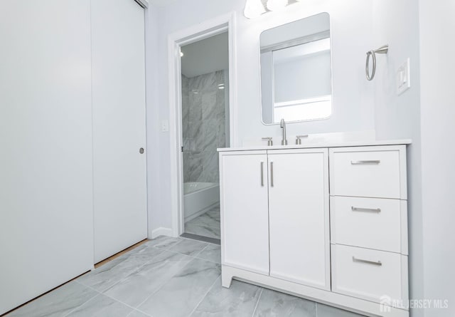 372-B Duranta Plz, Monroe, NJ 08831 - full bathroom featuring marble look tile flooring and vanity